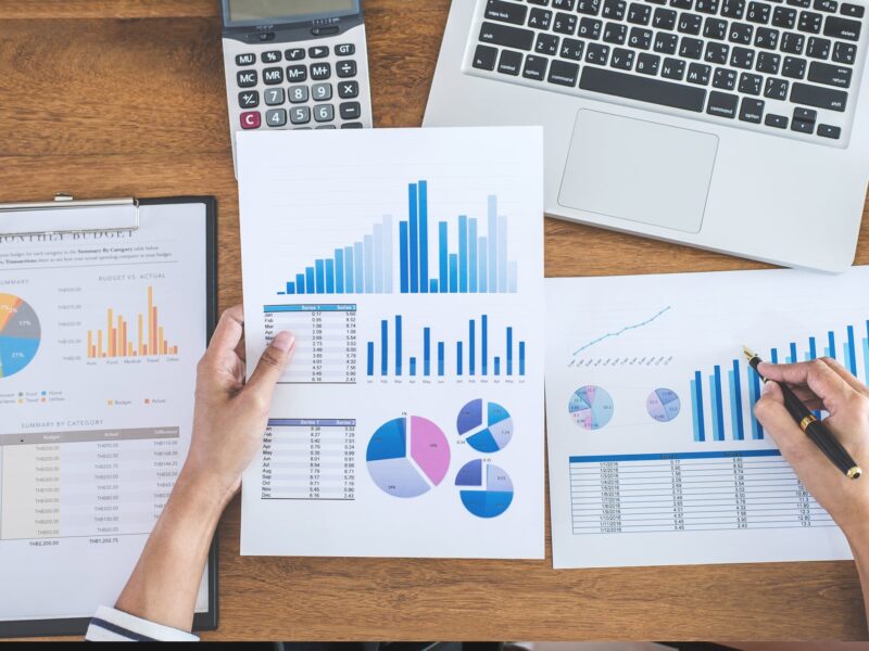 reviewing sales and inventory on paper